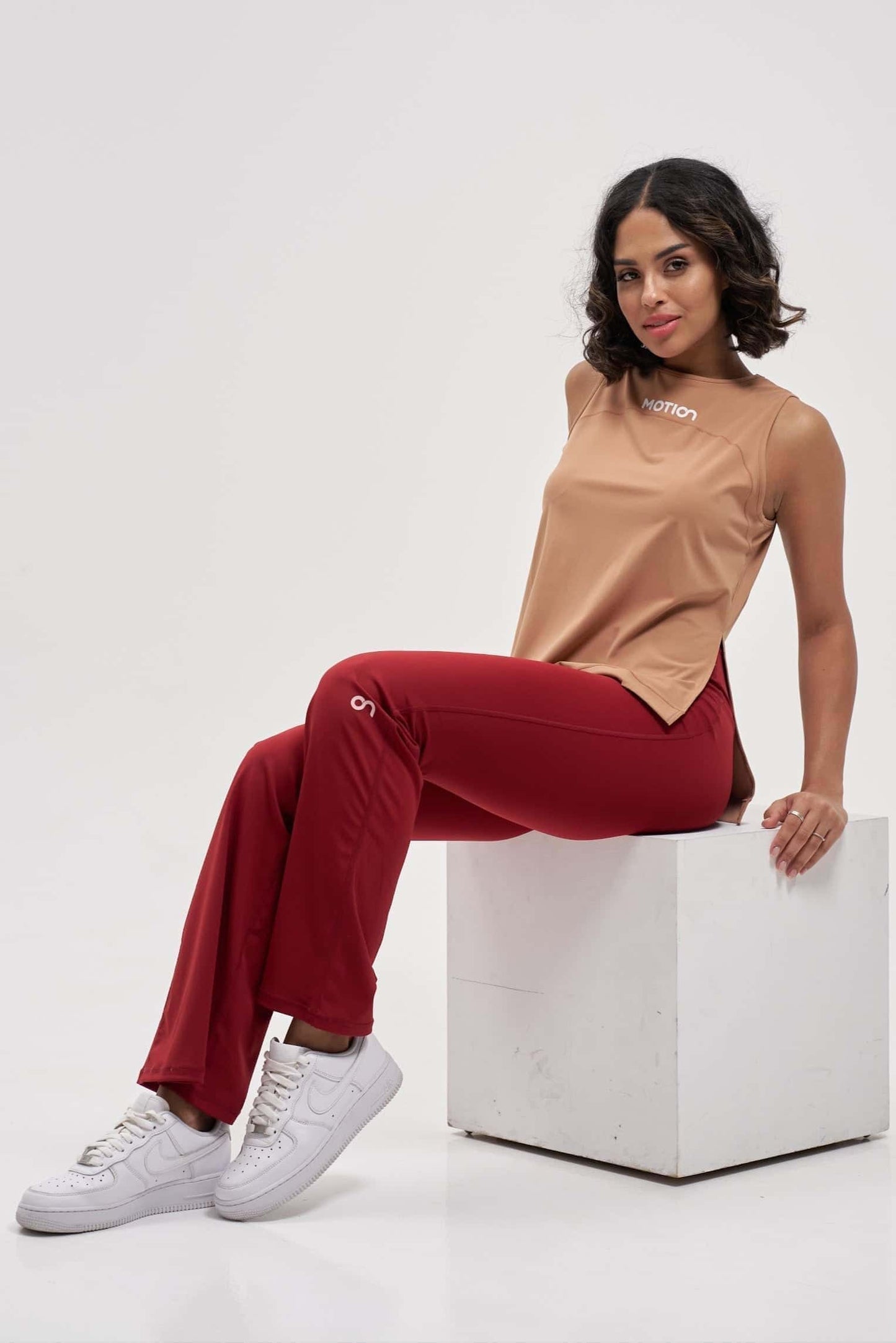 trendy gym wear Peach Racerback Workout Tank at motion activewear