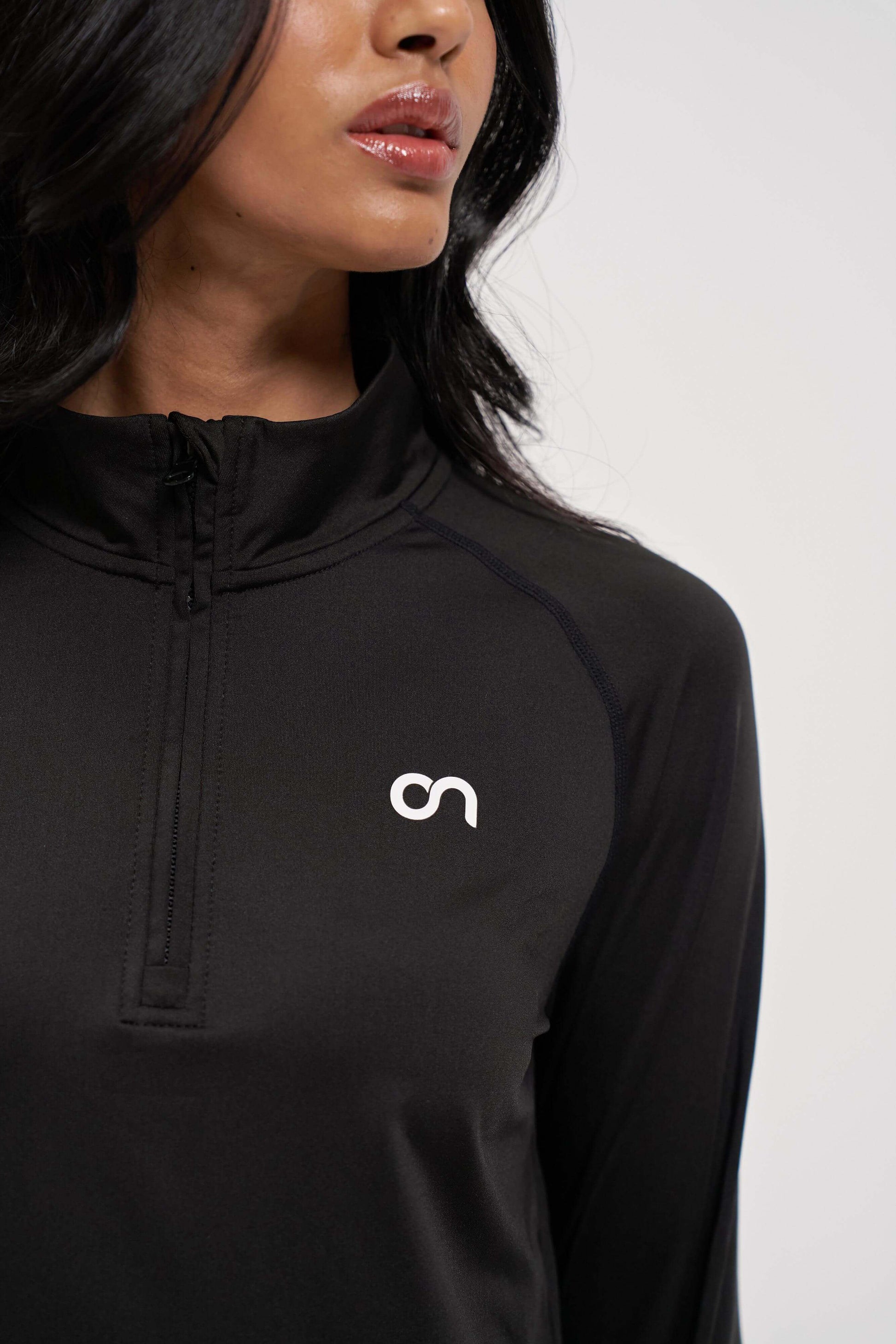 Black high-neck workout top for women - perfect for gym and yoga